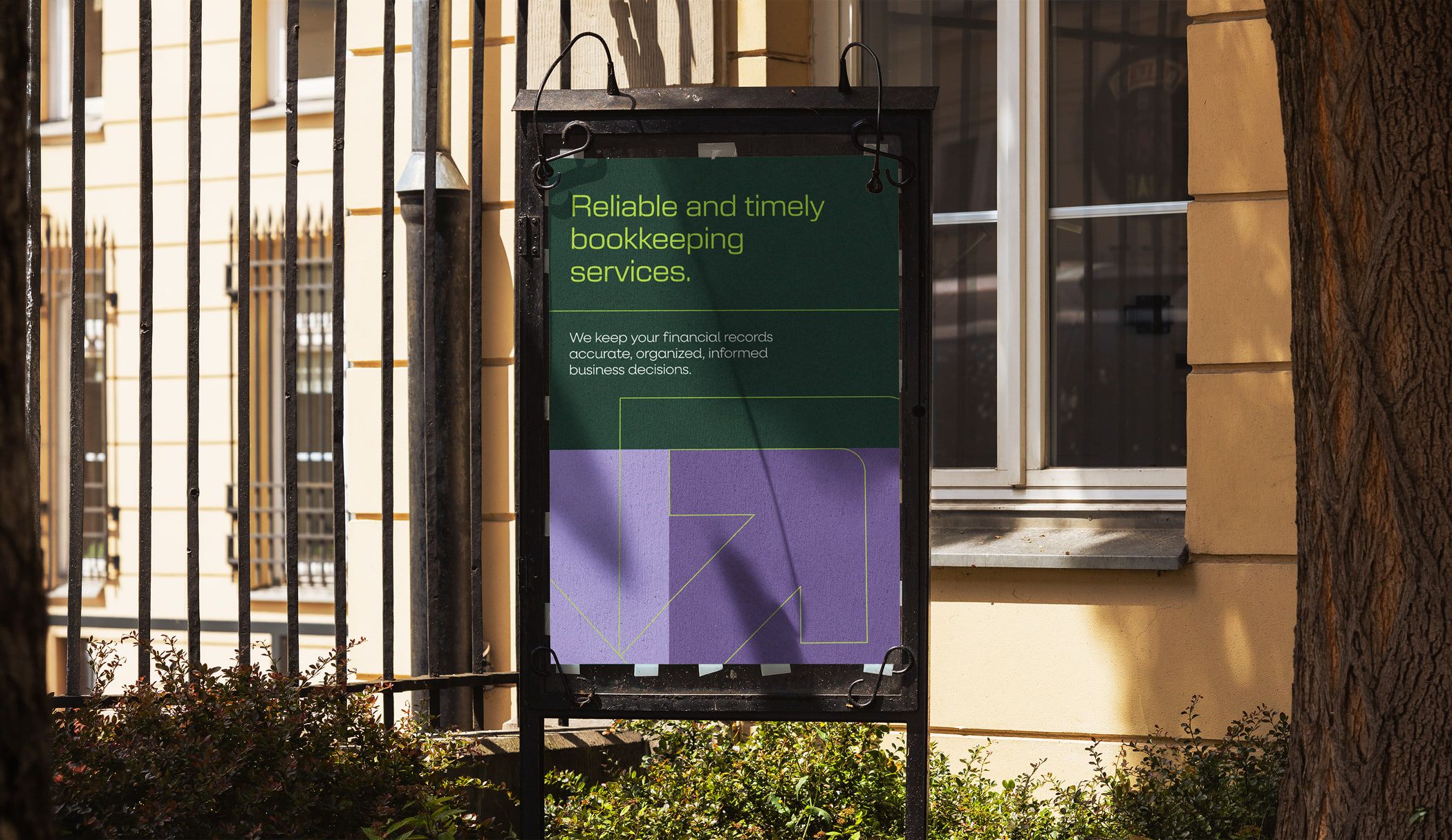 Yield poster in a street sign stand: “Reliable and timely bookkeeping services.”